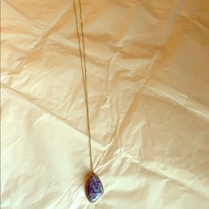 Gold chain necklace with marble pendant